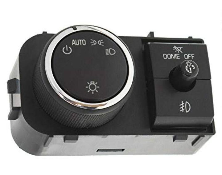 مفتاح تحكم في مصابيح السيارة الأمامية.